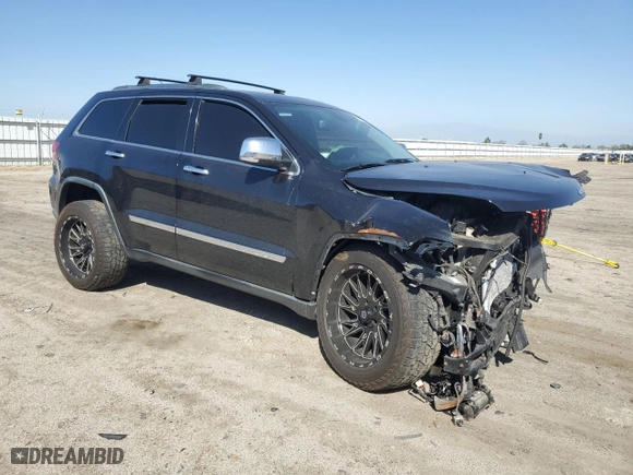 2013 Jeep Grand Cherokee Overland Summit with VIN 1C4RJFCT1DC635178, listed as a Copart auction lot 50613695 with 119,509 mi miles and Salvage Title. Bid and sale history available at carsss.com. Image 4.