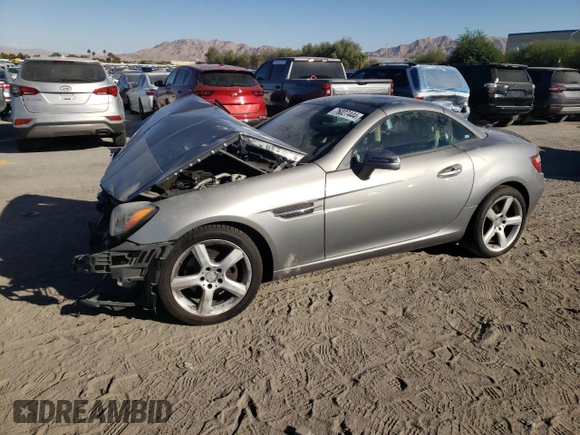2014 Mercedes-Benz SLK 250 z VIN WDDPK4HA7EF088102, wystawiony jako Copart lot #76027444 z przebiegiem 73 913 mil mil oraz Szkoda całkowita • Salvage title. Historia ofert i sprzedaży dostępna na DreamBid. Obrazek 1.