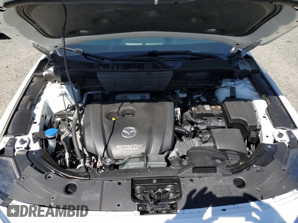 2018 Mazda CX-5 Grand Touring with VIN JM3KFBDM0J0419989, listed as a Copart auction lot 62868005 with 120,217 mi miles and Salvage title. Bid and sale history available at DreamBid. Image 12.