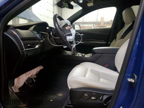 2023 Cadillac XT4 AWD Sport z VIN 1GYFZFR47PF153453, wystawiony jako Copart lot #56988695 z przebiegiem 67 533 mil mil oraz Szkoda całkowita • Salvage title. Historia ofert i sprzedaży dostępna na DreamBid. Obrazek 7.