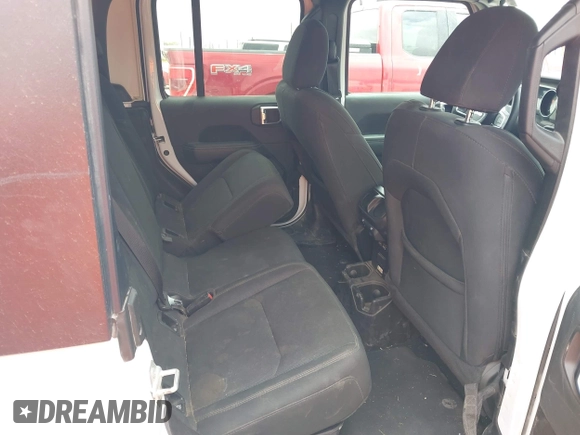 2023 Jeep Gladiator Overland z VIN 1C6HJTFG7PL566484, wystawiony jako IAAI lot #42424428 z przebiegiem 52 057 mil mil oraz . Historia ofert i sprzedaży dostępna na DreamBid. Obrazek 8.