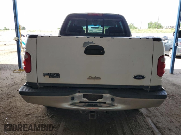 2001 Ford F-150 XLT with VIN 1FTRW08L41KB76026, listed as a Copart auction lot 63526545 with 174,126 mi miles and Clean title. Bid and sale history available at DreamBid. Image 6.