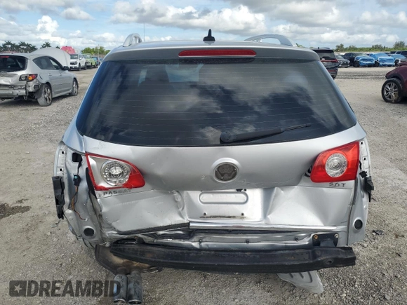 2009 Volkswagen Passat Komfort with VIN WVWXK73C09E140427, listed as a Copart auction lot 60374115 with 113,923 mi miles and Salvage title. Bid and sale history available at DreamBid. Image 6.