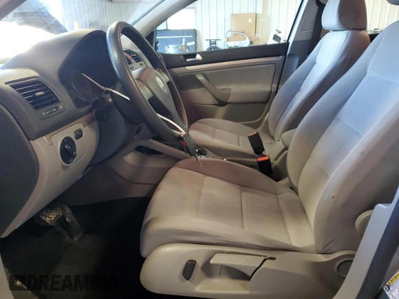 2009 Volkswagen Rabbit S with VIN WVWDA71K39W068097, listed as a Copart auction lot 88884305 with 134,312 mi miles and Salvage title. Bid and sale history available at DreamBid. Image 7.