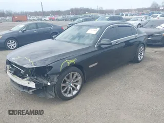 2015 BMW 7 Series 740Li xDrive with VIN WBAYF4C55FD874116, listed as a IAAI auction lot 41877144 with 156,280 mi miles. Bid and sale history available at carsss.com. Image 2.