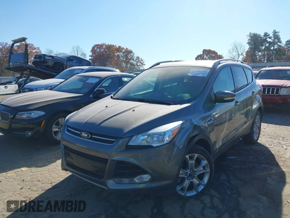 2014 Ford Escape Titanium with VIN 1FMCU9J94EUC50534, listed as a IAAI auction lot 41040341 with 115,502 mi miles. Bid and sale history available at carsss.com. Image 16.