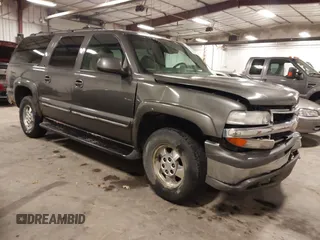 2002 Chevrolet Suburban LT z VIN 1GNFK16Z92J209533, wystawiony jako IAAI lot #41561925 z przebiegiem 418 660 mil mil oraz . Historia ofert i sprzedaży dostępna na DreamBid. Obrazek 1.