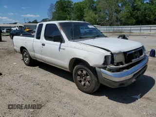 1999 Nissan Frontier XE with VIN 1N6DD26S3XC326231, listed as a Copart auction lot 51710615 with 228,174 mi miles and Salvage title. Bid and sale history available at DreamBid. Image 4.