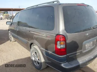 2003 Chevrolet Venture w/1SA Pkg with VIN 1GNDX03EX3D181116, listed as a IAAI auction lot 41204381 with 138,044 mi miles. Bid and sale history available at carsss.com. Image 3.