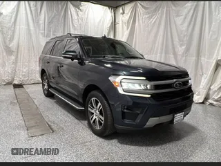 2022 Ford Expedition XLT z VIN 1FMJU1JT1NEA06886, wystawiony jako Copart lot #58208225 z przebiegiem 101 175 mil mil oraz Czysty tytuł • Clean title. Historia ofert i sprzedaży dostępna na DreamBid. Obrazek 1.