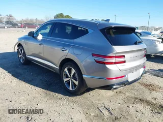 2023 Genesis GV80 with VIN KMUHCESC6PU128600, listed as a IAAI auction lot 41179553 with 33,225 mi miles and . Bid and sale history available at DreamBid. Image 3.