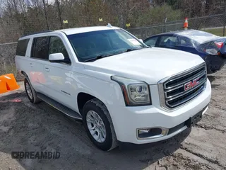 2016 GMC Yukon XL SLE with VIN 1GKS1FKC0GR331459, listed as a IAAI auction lot 41557718 with 203,803 mi miles. Bid and sale history available at carsss.com. Image 1.