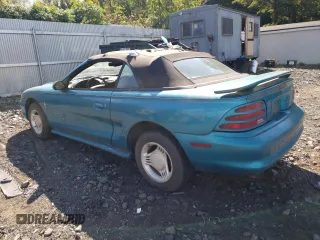 1994 Ford Mustang with VIN 1FALP4442RF186105, listed as a Copart auction lot 74677924 with 185,072 mi miles and Clean title. Bid and sale history available at DreamBid. Image 2.