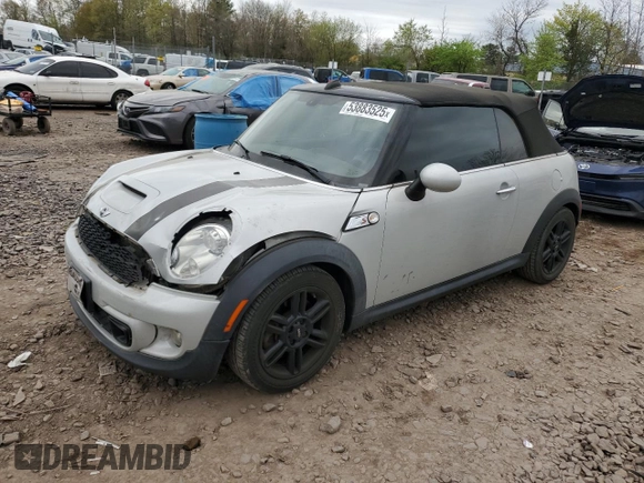 2015 MINI Convertible S with VIN WMWZP3C57F2A91437, listed as a Copart auction lot 53883525 with 28,185 mi miles and Salvage title. Bid and sale history available at DreamBid. Image 1.