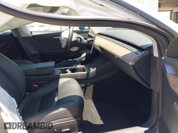 2023 Tesla Model 3 с VIN 5YJ3E1EAXPF568984, выставлен на аукционе IAAI как лот 42346535 с пробегом 32 242 миль миль и . История ставок и продаж доступна на DreamBid. Изображение 5.