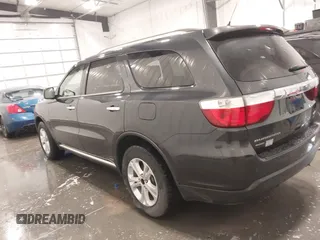 2013 Dodge Durango Crew with VIN 1C4RDJDGXDC691311, listed as a IAAI auction lot 41642267 with 167,098 mi miles and . Bid and sale history available at DreamBid. Image 15.