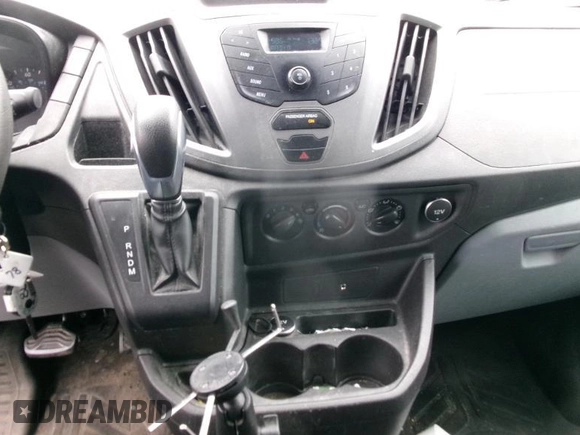 2016 Ford Transit Cargo with VIN 1FTYR1ZM4GKA09500, listed as a IAAI auction lot 42304806 with 186,333 mi miles and . Bid and sale history available at DreamBid. Image 14.
