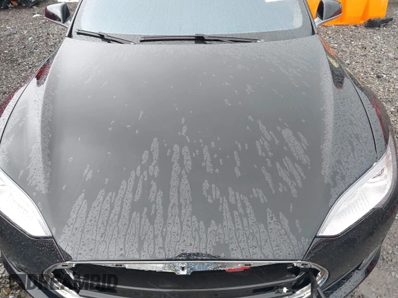 2014 Tesla Model S 60 with VIN 5YJSA1H18EFP28053, listed as a IAAI auction lot 41191521 with 82,207 mi miles and . Bid and sale history available at DreamBid. Image 10.