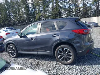 2016 Mazda CX-5 Grand Touring with VIN JM3KE4DY9G0895006, listed as a IAAI auction lot 41703146 with 39,359 mi miles. Bid and sale history available at carsss.com. Image 14.