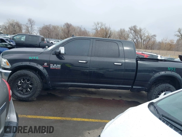2015 Ram 2500 Laramie with VIN 3C6UR5NL2FG614941, listed as a IAAI auction lot 41785882 with 155,061 mi miles and . Bid and sale history available at DreamBid. Image 14.