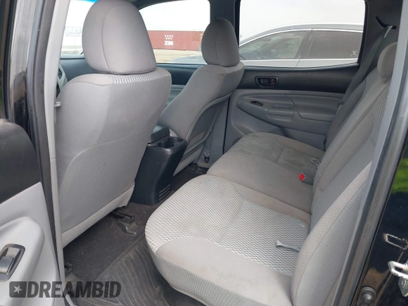 2014 Toyota Tacoma PreRunner with VIN 3TMJU4GN9EM157662, listed as a IAAI auction lot 41952359 with 109,002 mi miles and . Bid and sale history available at DreamBid. Image 8.