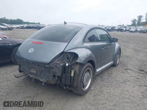 2012 Volkswagen Beetle 2.5L PZEV with VIN 3VWJP7AT2CM618436, listed as a IAAI auction lot 42297812 with 139,869 mi miles and . Bid and sale history available at DreamBid. Image 4.
