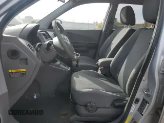 2009 Hyundai Tucson GLS with VIN KM8JM12B79U012399, listed as a Copart auction lot 77663414 with 164,615 mi miles and Salvage Title. Bid and sale history available at carsss.com. Image 7.