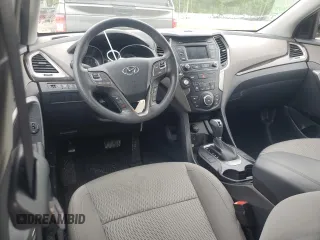 2017 Hyundai Santa Fe 2.4L z VIN 5NMZT3LBXHH038022, wystawiony jako Copart lot #51060545 z przebiegiem 63 790 mil mil oraz Szkoda całkowita • Salvage title. Historia ofert i sprzedaży dostępna na DreamBid. Obrazek 8.