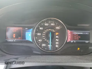 2013 Ford Edge SEL z VIN 2FMDK4JC4DBA69317, wystawiony jako Copart lot #77084544 z przebiegiem 108 808 mil mil oraz Szkoda całkowita • Salvage title. Historia ofert i sprzedaży dostępna na DreamBid. Obrazek 9.