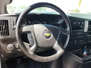 2021 Chevrolet Express Cargo with VIN 1GCWGAFP2M1303233, listed as a IAAI auction lot 42731173 with 57,034 mi miles and . Bid and sale history available at DreamBid. Image 3.
