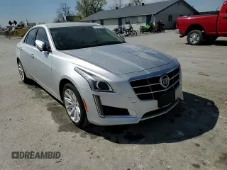 2014 Cadillac CTS Luxury RWD z VIN 1G6AR5SX0E0134728, wystawiony jako Copart lot #50812825 z przebiegiem 52 573 mil mil oraz Szkoda całkowita • Salvage title. Historia ofert i sprzedaży dostępna na DreamBid. Obrazek 10.