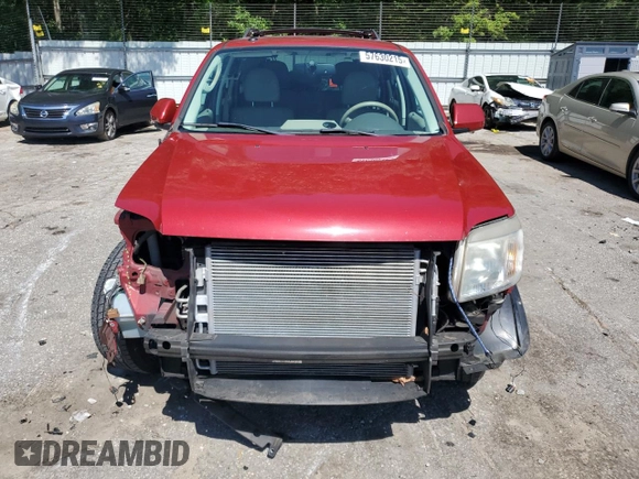 2011 Mercury Mariner Premier with VIN 4M2CN8HG0BKJ08313, listed as a Copart auction lot 57630215 with 188,818 mi miles and Salvage title. Bid and sale history available at DreamBid. Image 5.