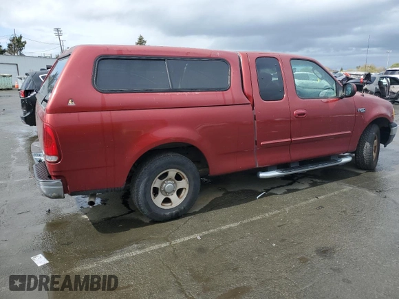 2002 Ford F-150 XL with VIN 1FTRX17222NB12823, listed as a Copart auction lot 50454145 with 221,039 mi miles and Clean Title. Bid and sale history available at carsss.com. Image 3.