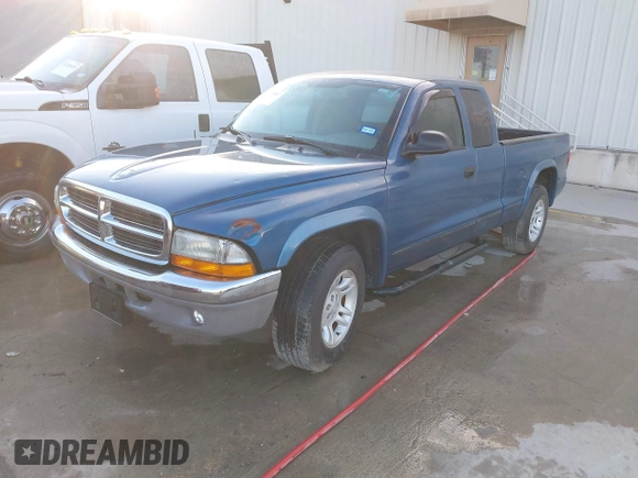2003 Dodge Dakota SLT z VIN 1D7HL42N93S196397, wystawiony jako IAAI lot #42105857 z przebiegiem 159 690 mil mil oraz . Historia ofert i sprzedaży dostępna na DreamBid. Obrazek 2.