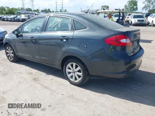 2011 Ford Fiesta SE z VIN 3FADP4BJ5BM219052, wystawiony jako IAAI lot #42297403 z przebiegiem 108 302 mil mil oraz . Historia ofert i sprzedaży dostępna na DreamBid. Obrazek 3.