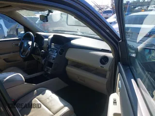 2015 Honda Pilot Touring with VIN 5FNYF3H94FB002236, listed as a IAAI auction lot 41735221 with 112,766 mi miles. Bid and sale history available at carsss.com. Image 5.