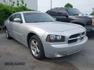 2010 Dodge Charger SXT with VIN 2B3CA3CV0AH287289, listed as a IAAI auction lot 42036118 with 283,080 mi miles. Bid and sale history available at carsss.com. Image 1.