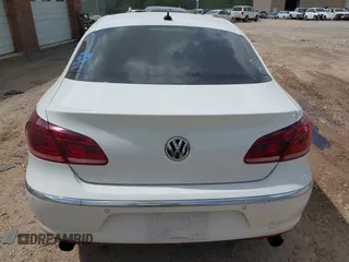 2014 Volkswagen CC Executive z VIN WVWGU7ANXEE507486, wystawiony jako IAAI lot #41943516 z przebiegiem 148 796 mil mil oraz . Historia ofert i sprzedaży dostępna na DreamBid. Obrazek 16.