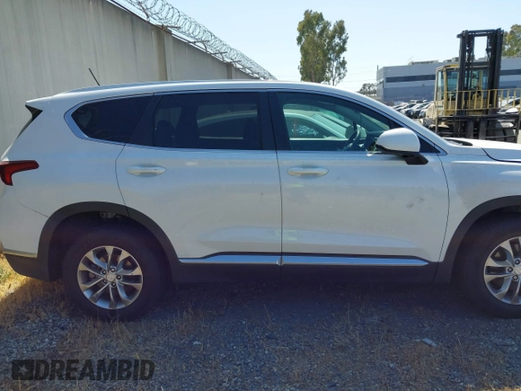 2020 Hyundai Santa Fe SE with VIN 5NMS23AD8LH285363, listed as a IAAI auction lot 42408647 with 60,058 mi miles and . Bid and sale history available at DreamBid. Image 14.
