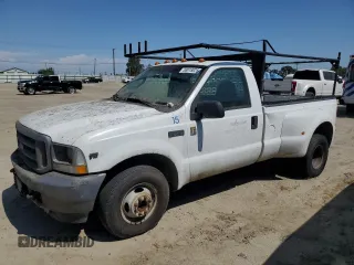 2003 Ford F-350 with VIN 1FTWF32S33EC43270, listed as a Copart auction lot 58818025 with 303,533 mi miles and Clean title. Bid and sale history available at DreamBid. Image 1.