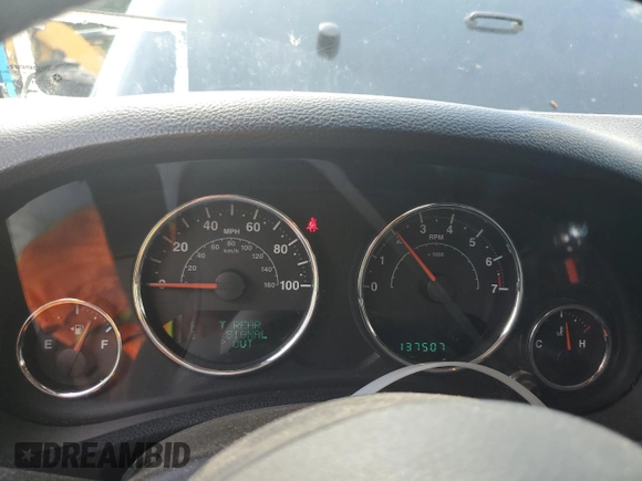 2012 Jeep Wrangler Sport with VIN 1C4AJWAG6CL256792, listed as a Copart auction lot 62634515 with 137,507 mi miles and Salvage title. Bid and sale history available at DreamBid. Image 9.