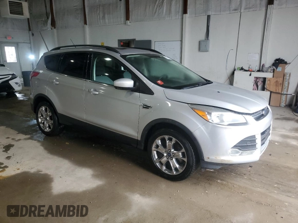 2014 Ford Escape SE z VIN 1FMCU9G97EUC43696, wystawiony jako Copart lot #57409665 z przebiegiem 68 586 mil mil oraz Czysty tytuł • Clean title. Historia ofert i sprzedaży dostępna na DreamBid. Obrazek 4.