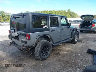 2016 Jeep Wrangler Unlimited Sport with VIN 1C4BJWDG2GL281985, listed as a IAAI auction lot 40518617 with 105,415 mi miles and . Bid and sale history available at DreamBid. Image 4.
