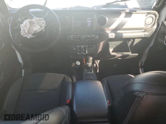 2021 Jeep Gladiator Freedom z VIN 1C6HJTAGXML557586, wystawiony jako Copart lot #43510795 z przebiegiem Nie podano mil oraz Szkoda całkowita • Salvage title. Historia ofert i sprzedaży dostępna na DreamBid. Obrazek 8.
