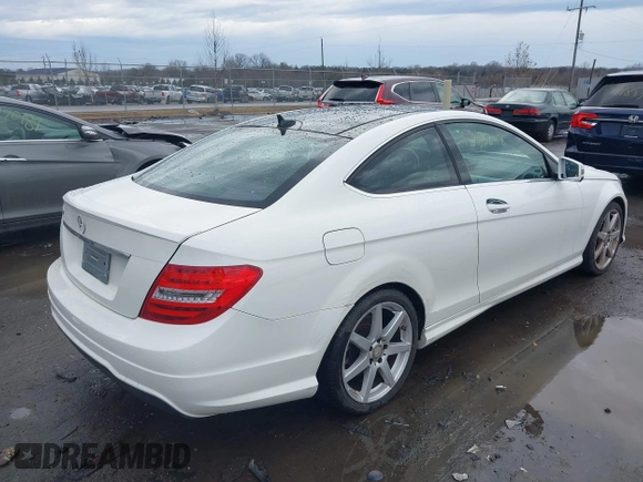 2015 Mercedes-Benz C-Class C 250 with VIN WDDGJ4HB6FG401261, listed as a IAAI auction lot 41483848 with 124,915 mi miles. Bid and sale history available at carsss.com. Image 4.