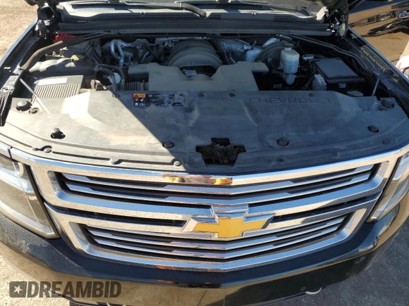 2015 Chevrolet Suburban LTZ with VIN 1GNSKKKC2FR634654, listed as a Copart auction lot 50337415 with 150,255 mi miles and Salvage Title. Bid and sale history available at DreamBid. Image 14.