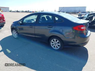 2011 Ford Fiesta SE with VIN 3FADP4BJ7BM135864, listed as a IAAI auction lot 42134479 with 118,573 mi miles. Bid and sale history available at carsss.com. Image 3.