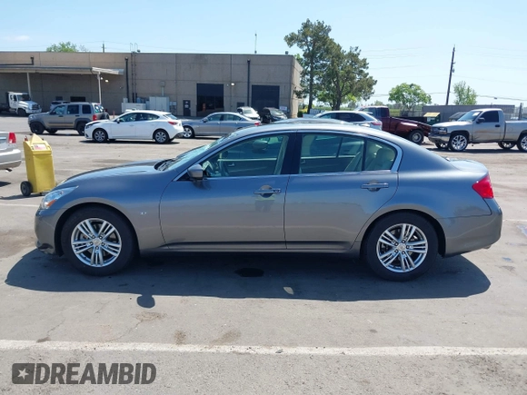 2015 Infiniti Q40 with VIN JN1CV6AP8FM580471, listed as a IAAI auction lot 42055612 with 64,494 mi miles. Bid and sale history available at carsss.com. Image 14.