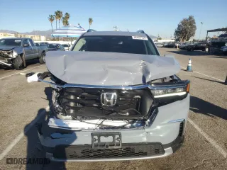 2025 Honda Pilot Touring with VIN 5FNYG2H73SB016693, listed as a Copart auction lot 46494165 with 1,259 mi miles and Salvage Title. Bid and sale history available at carsss.com. Image 5.