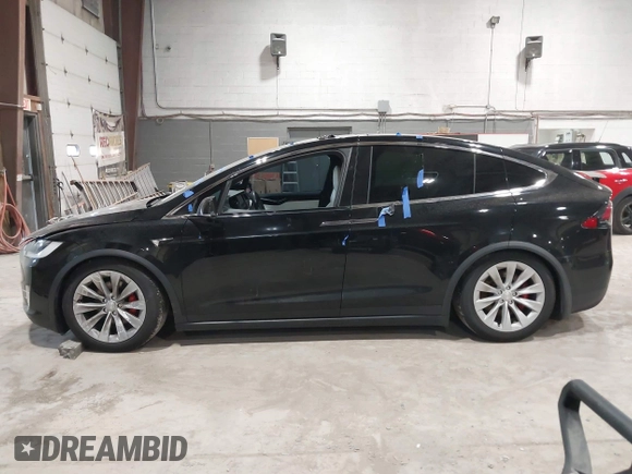 2019 Tesla Model X P90D with VIN 5YJXCAE4XKF180356, listed as a IAAI auction lot 42087926 with 79,041 mi miles. Bid and sale history available at carsss.com. Image 13.